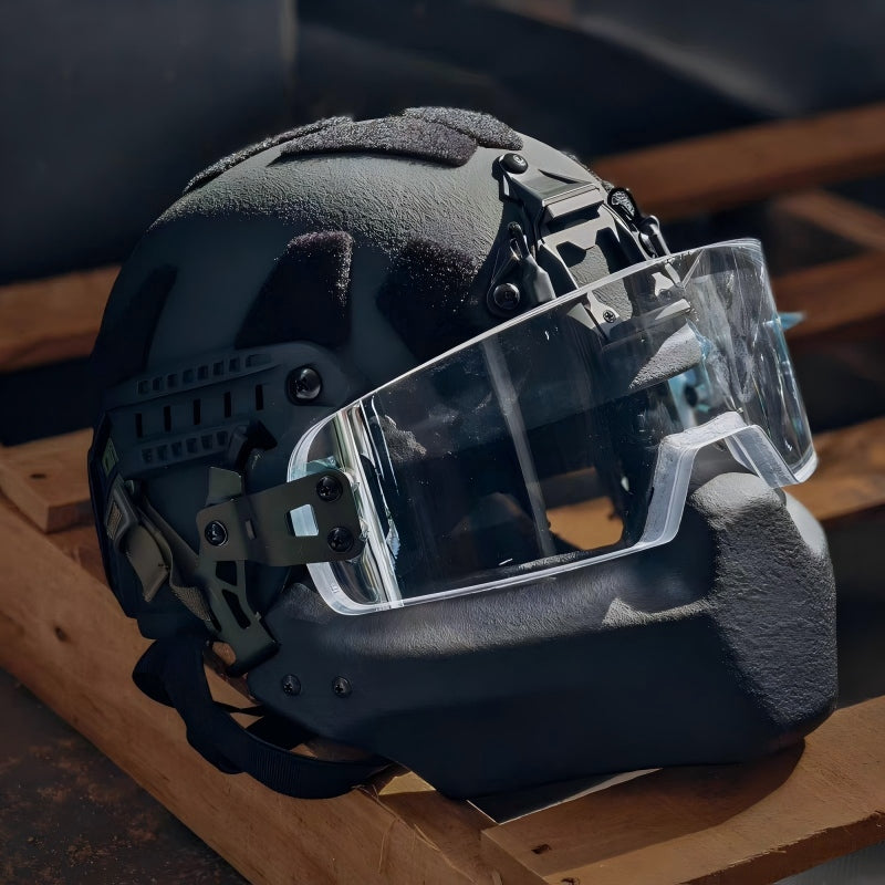 Front view of Level IIIA ACH MICH2000 tactical ballistic helmet with attached anti-fog face armor, shown in a realistic context setting